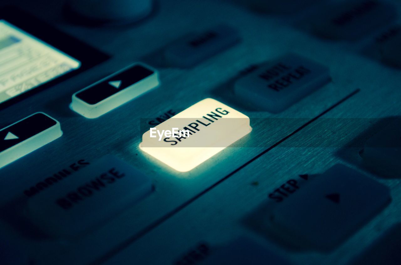 Close-up of music production button 
