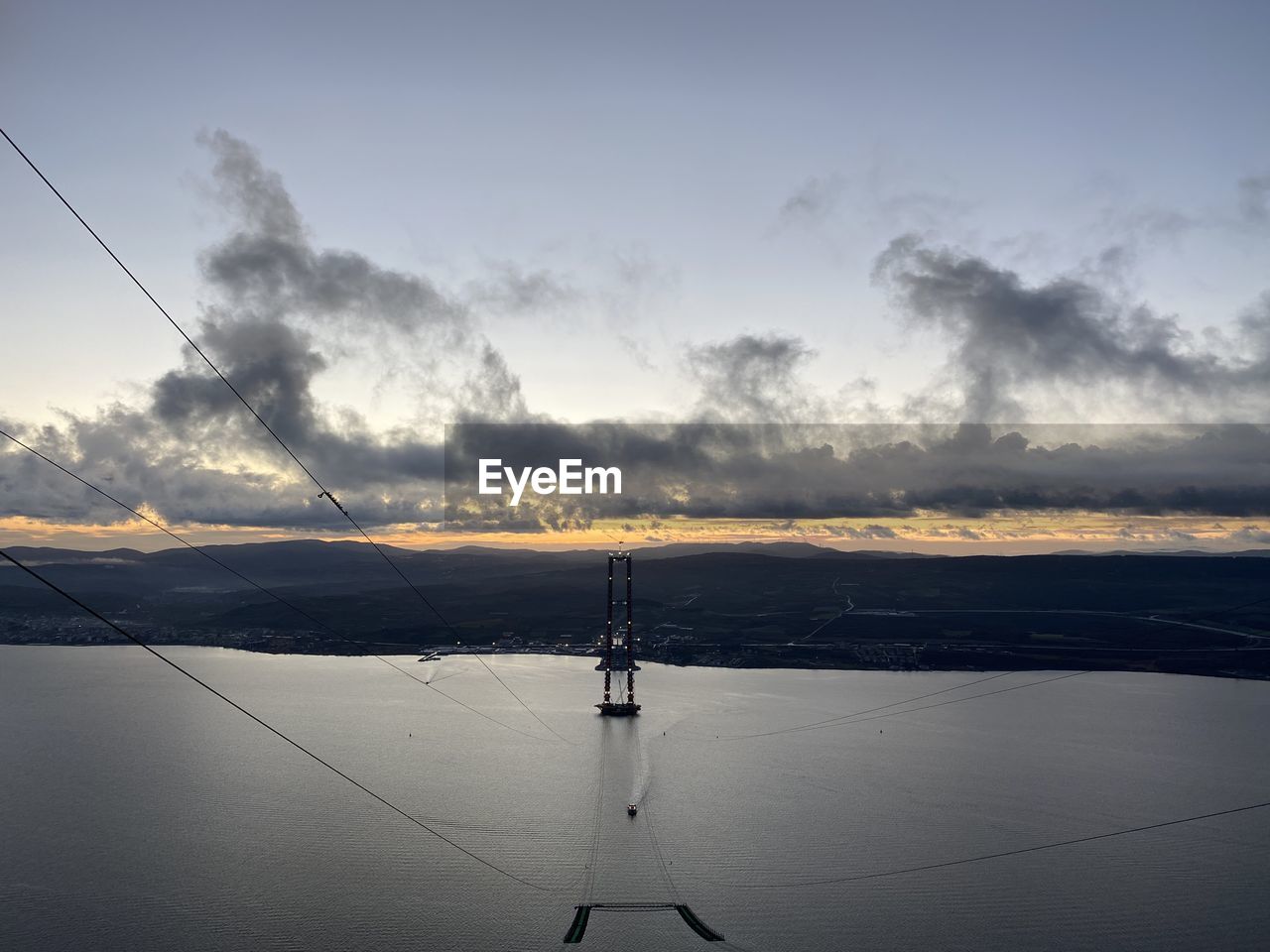 SCENIC VIEW OF SEA DURING SUNSET