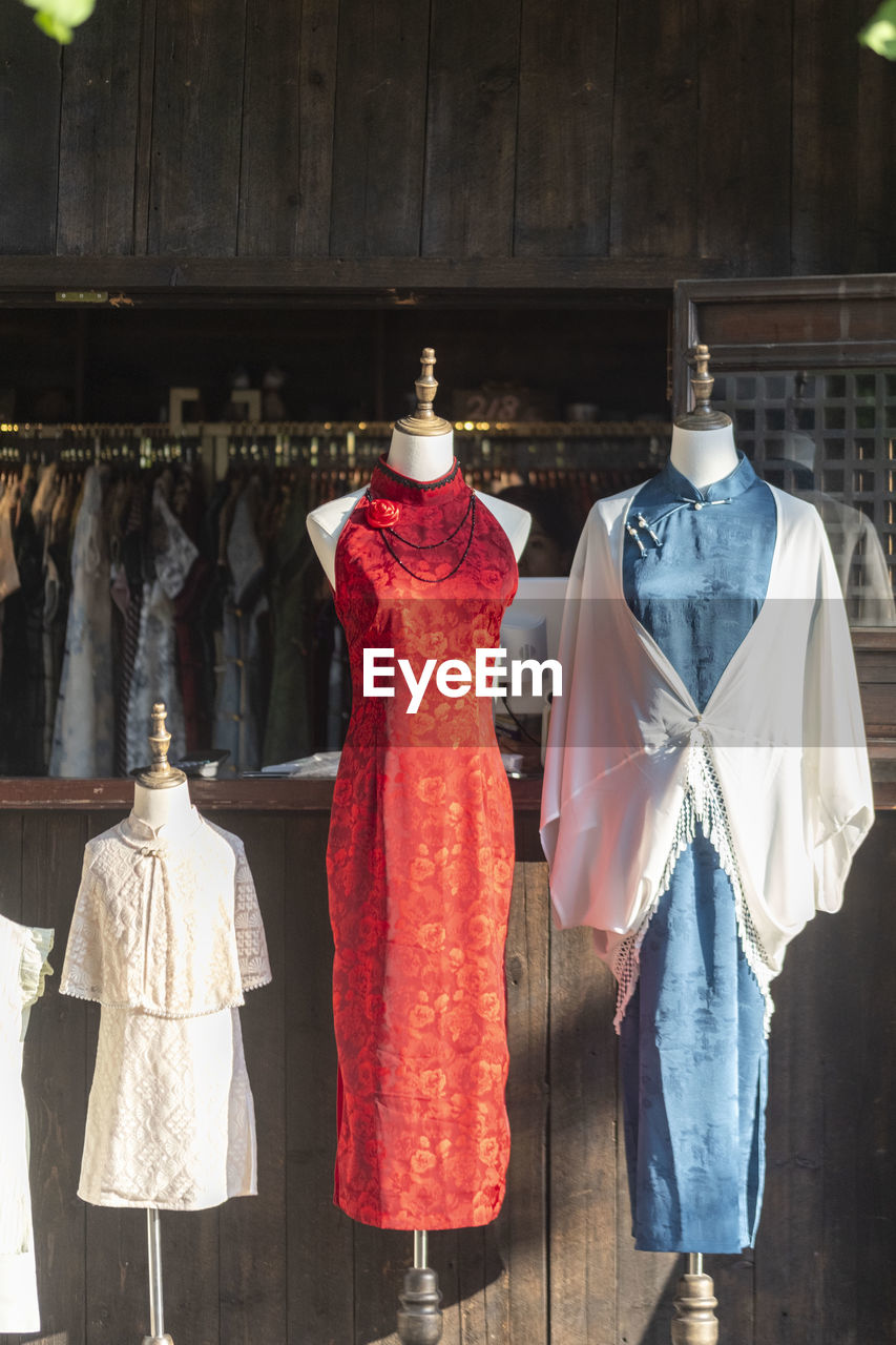 rear view of woman standing in store