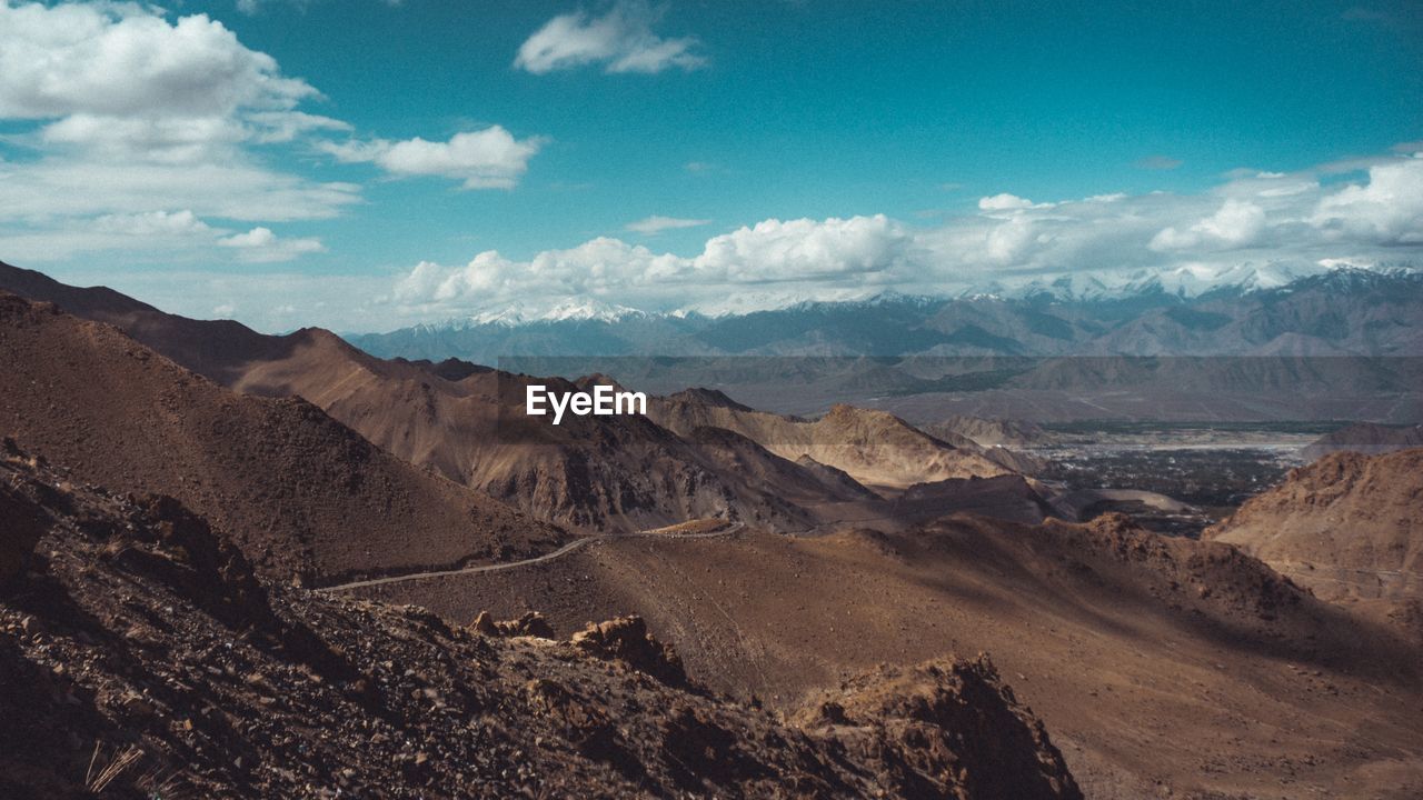 Panoramic view of landscape and mountains against sky