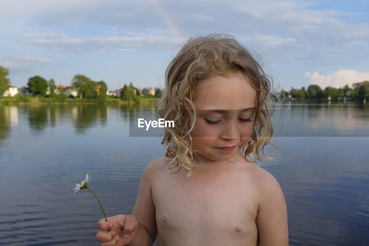 Portrait of cute girl in lake