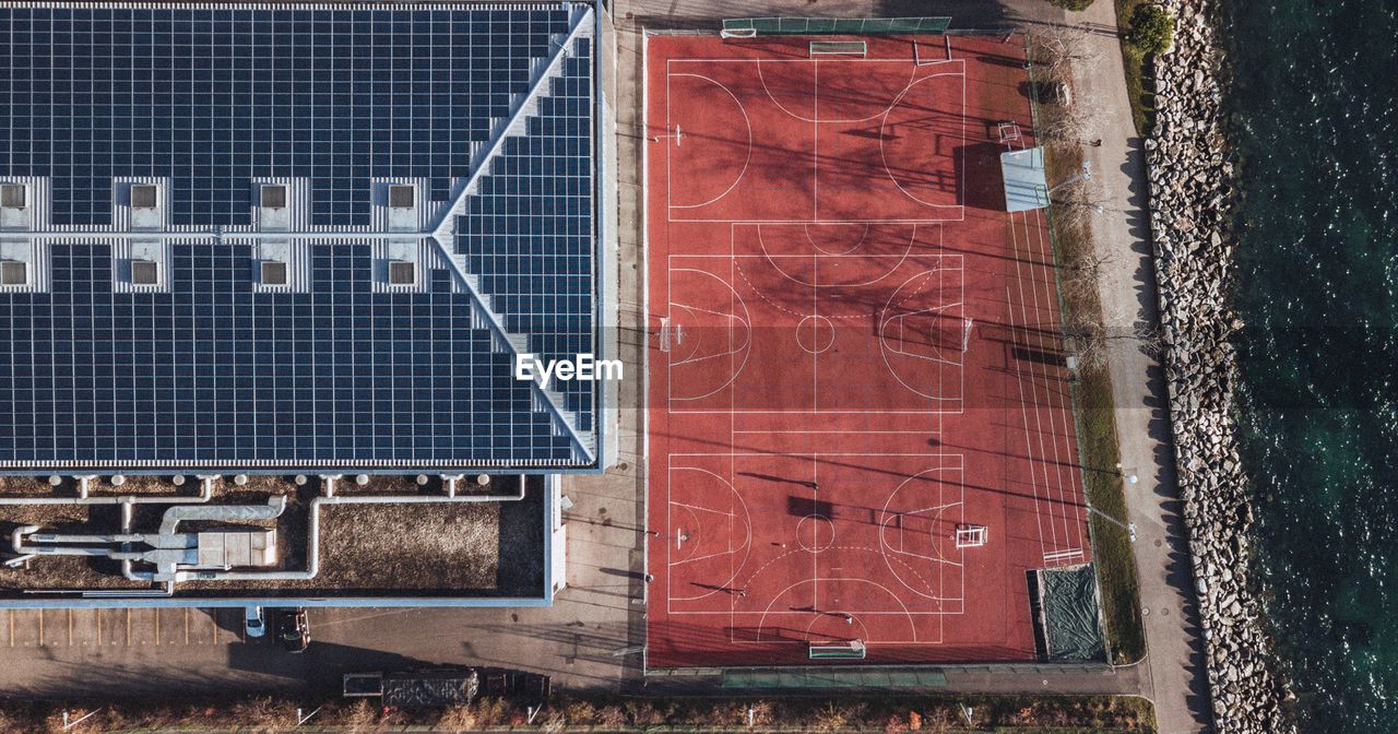 Aerial view of basketball court by building