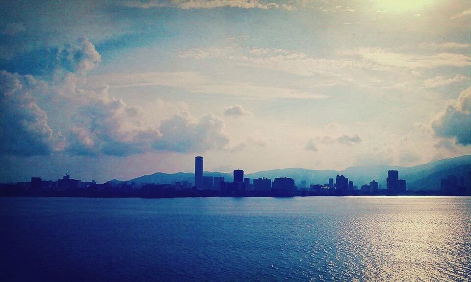 VIEW OF CITYSCAPE AT SUNSET