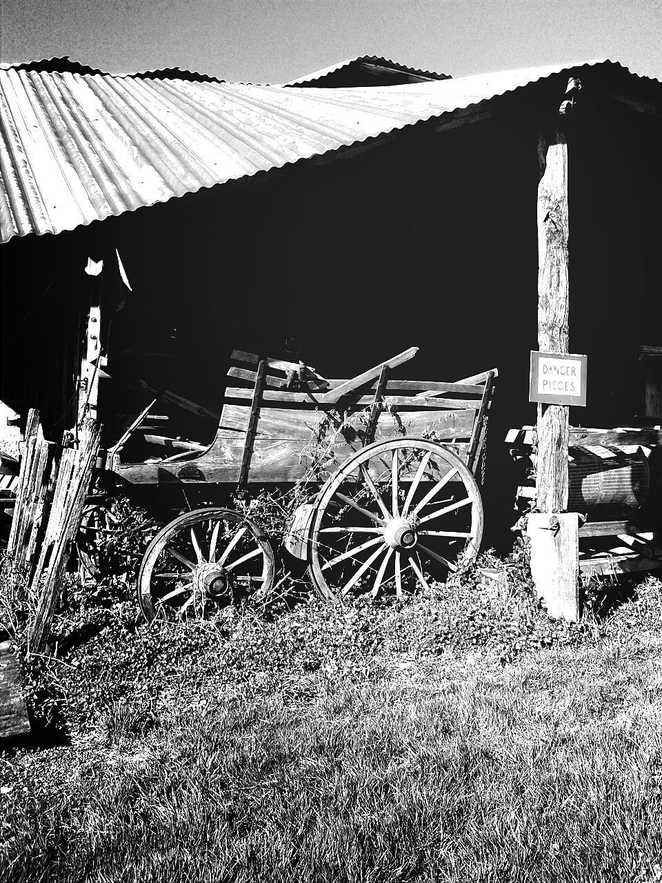 Abandoned cart in shed