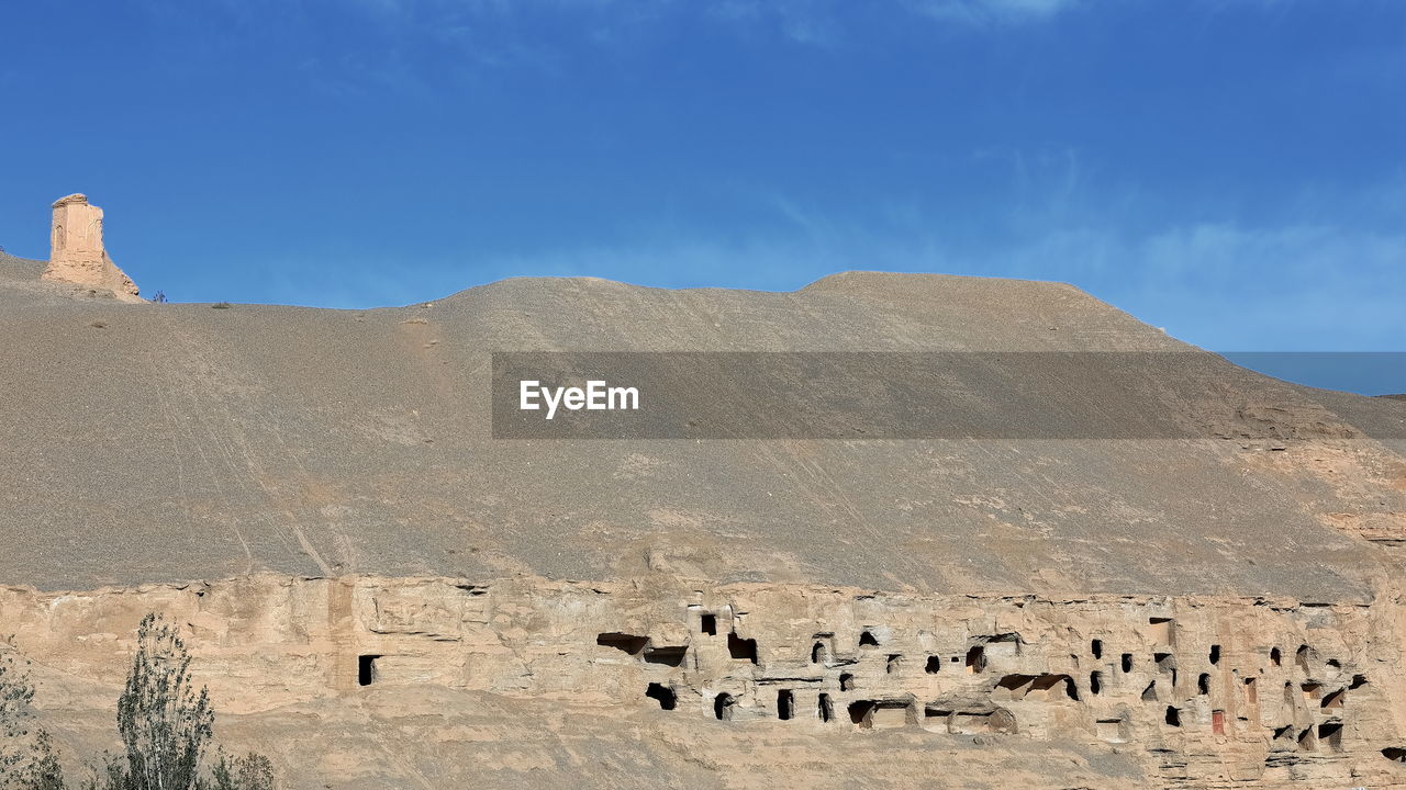 PANORAMIC VIEW OF CASTLE ON MOUNTAIN