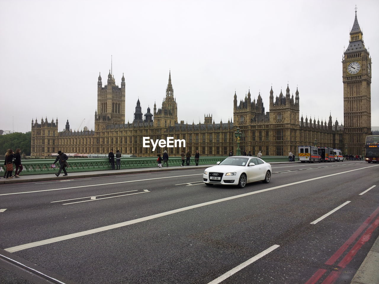 VEHICLES ON ROAD IN CITY