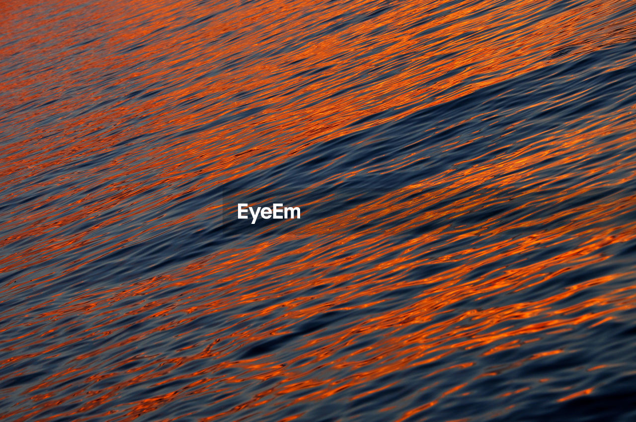 Water ripples, sea sunset background. mediterranean sea, croatia