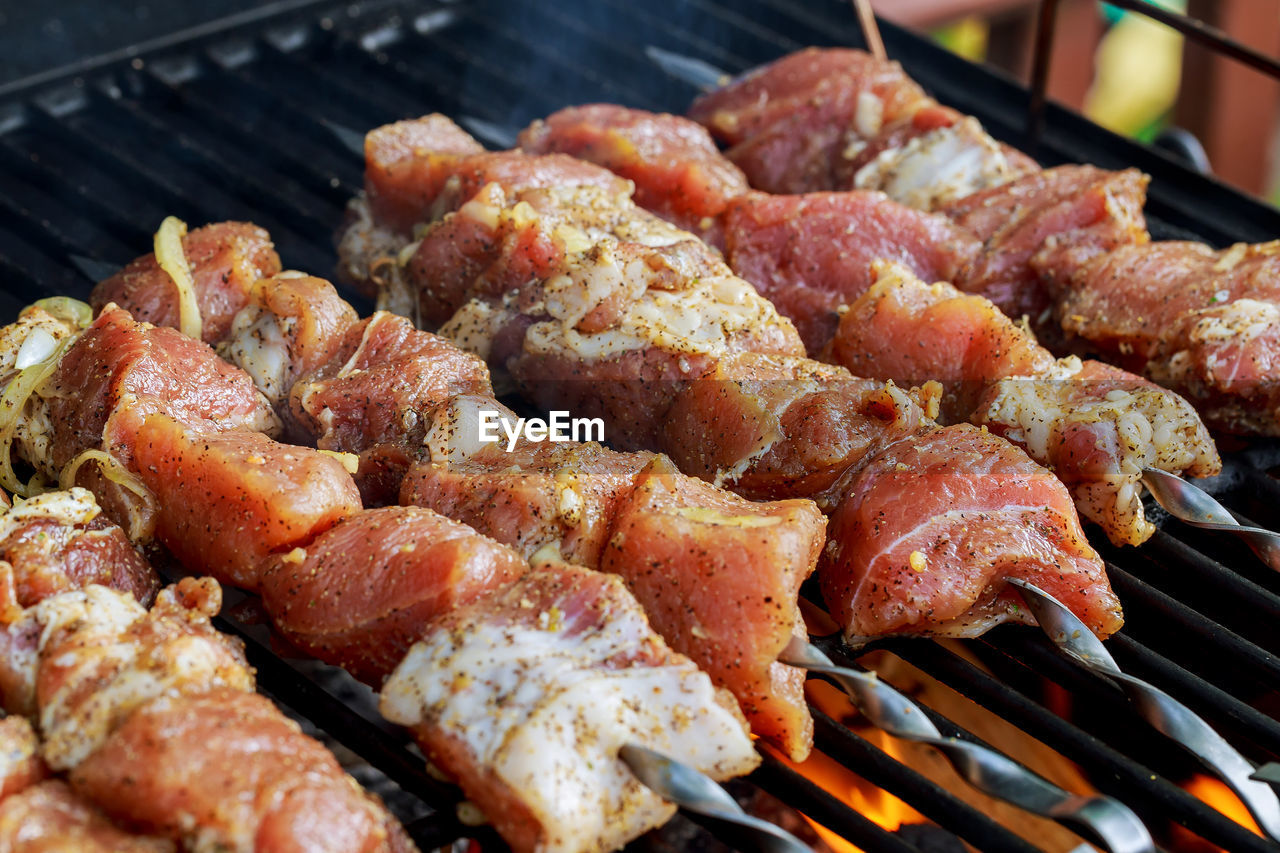 Close-up of meat on barbecue grill