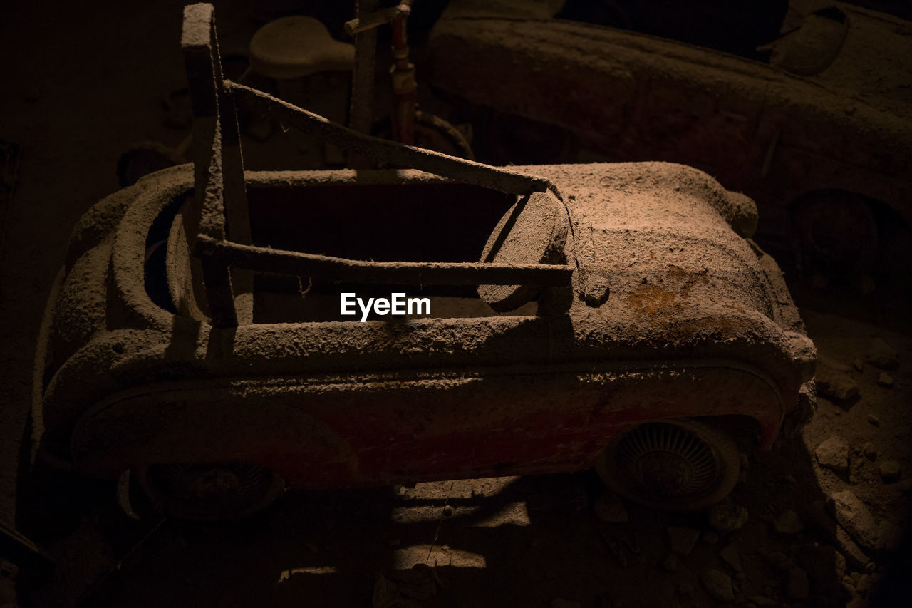 High angle view of abandoned toy car