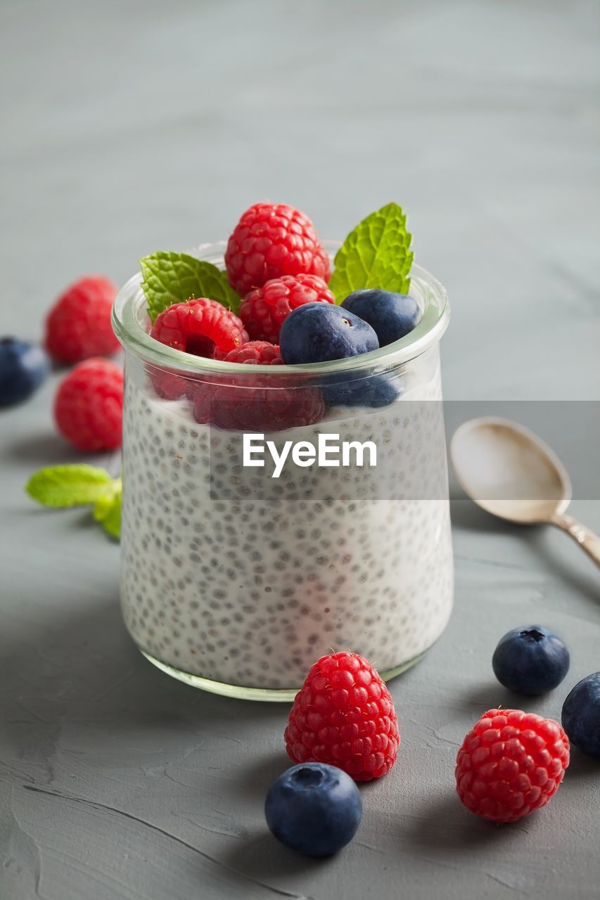 Close-up of berries in glass on table