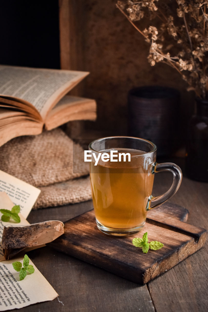 CLOSE-UP OF TEA SERVED ON TABLE AT HOME