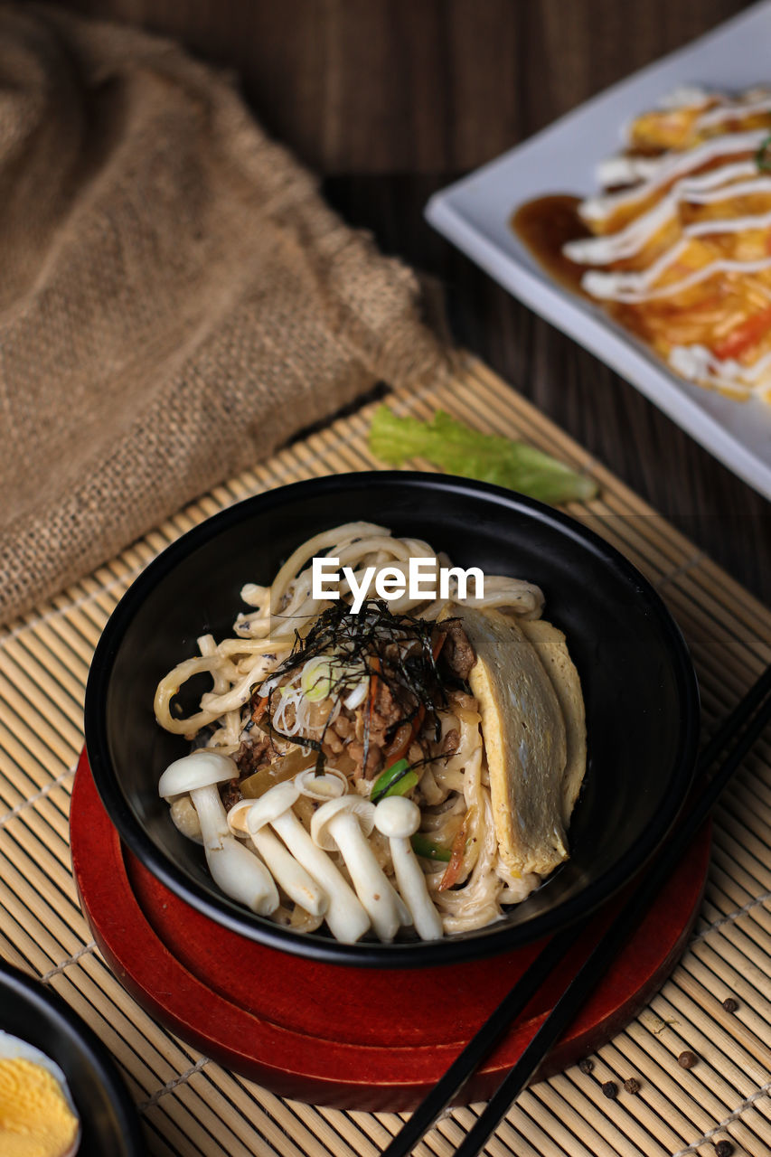 Delicious japanese dried mushroom ramen high angle view on table