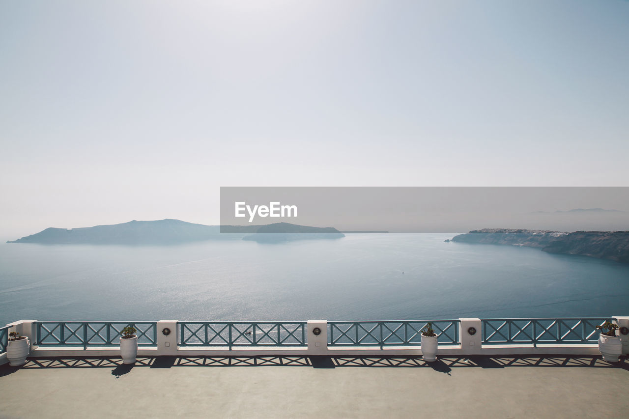 Scenic view of sea against clear sky on sunny day