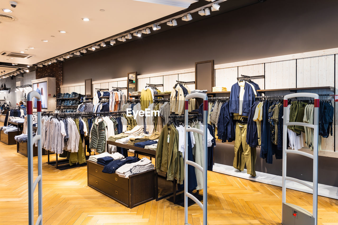 Interior of a brand new fashion clothing store. panorama, vilnius, lithuania 10 april 2022