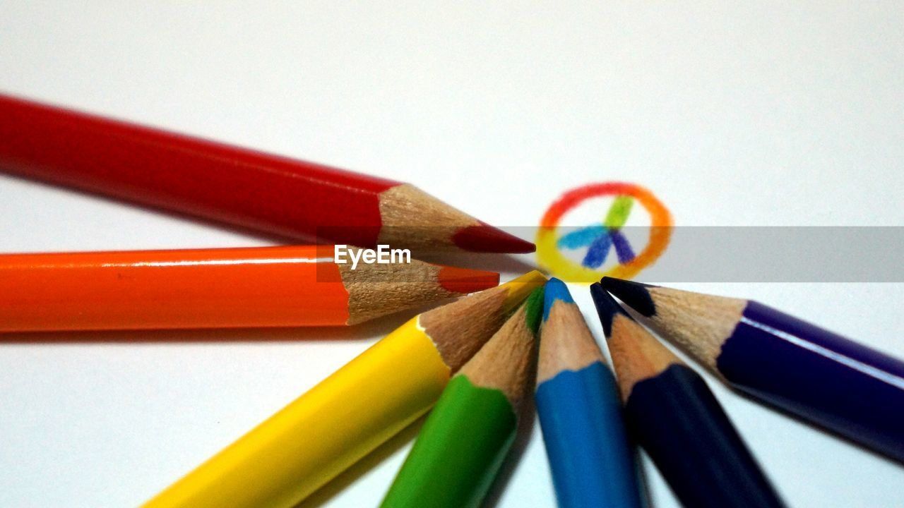 Close-up of colored pencils on table