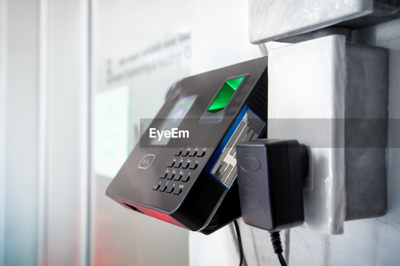 Close-up of biometric equipment on wall