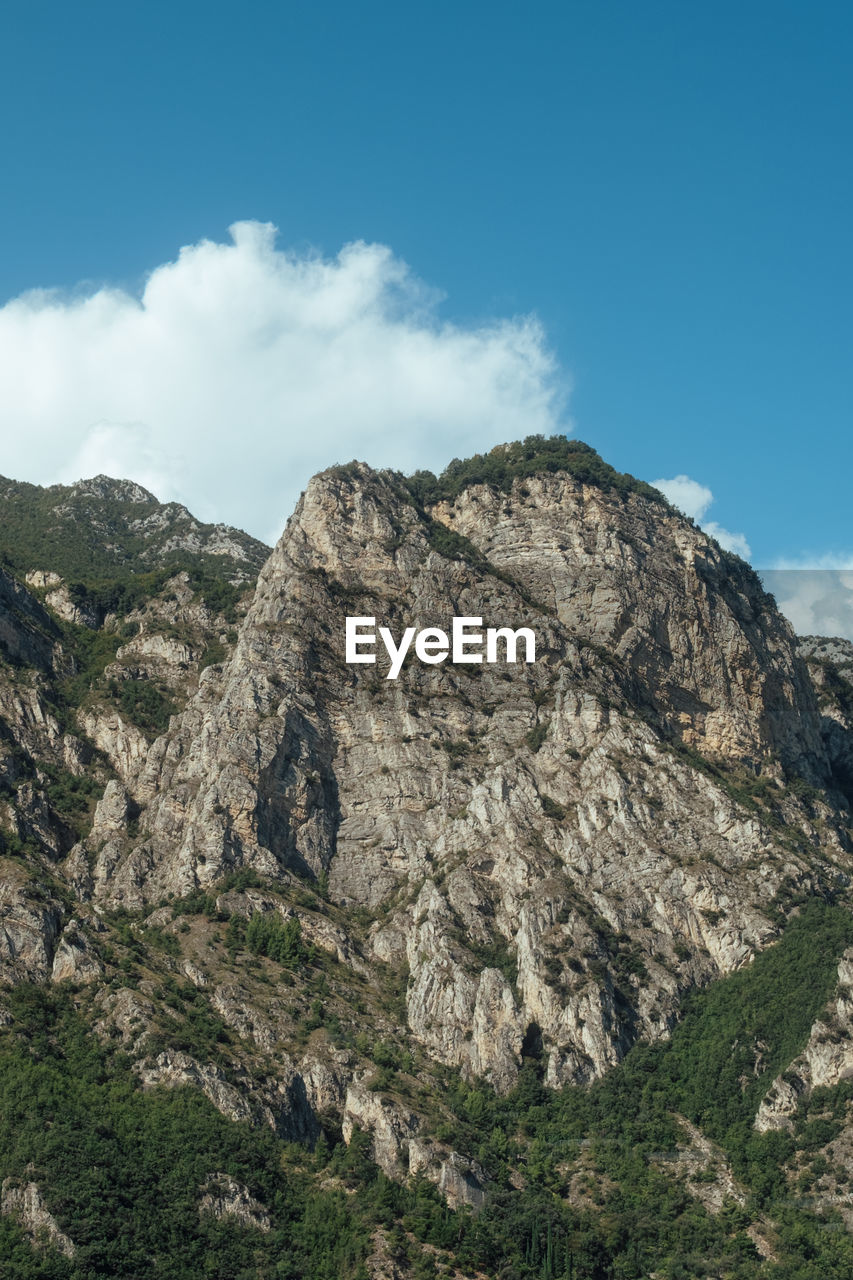 scenic view of mountains against clear blue sky