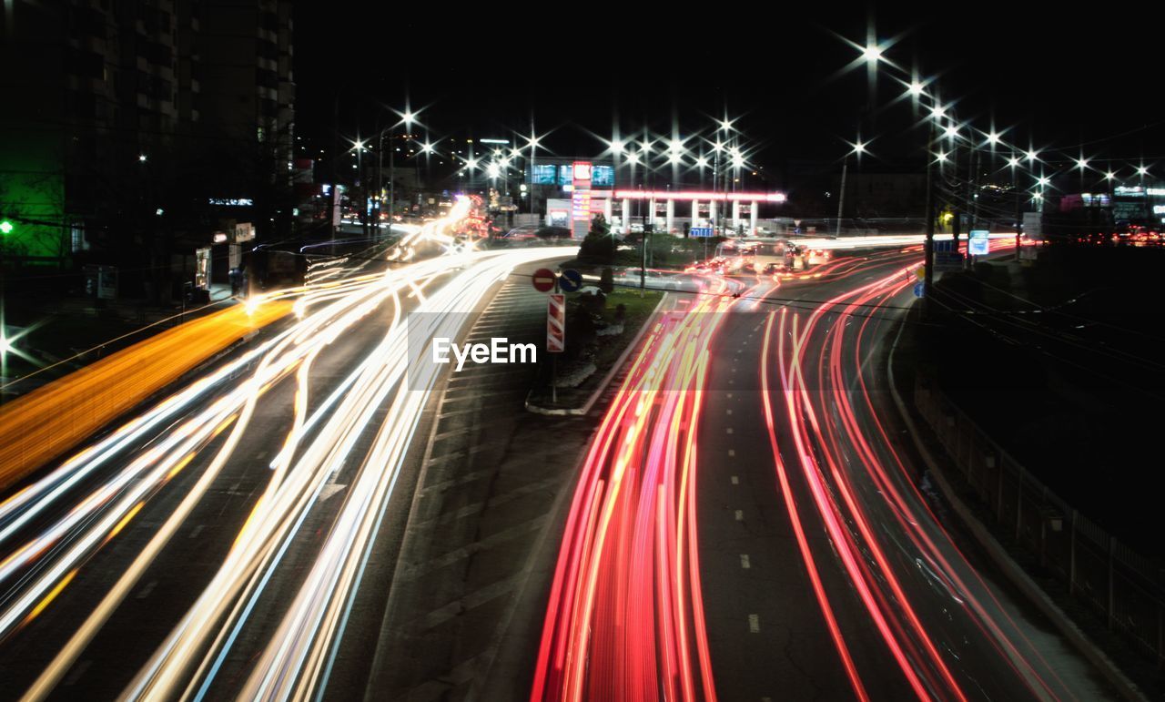 HIGH ANGLE VIEW OF LIGHT TRAILS ON STREET