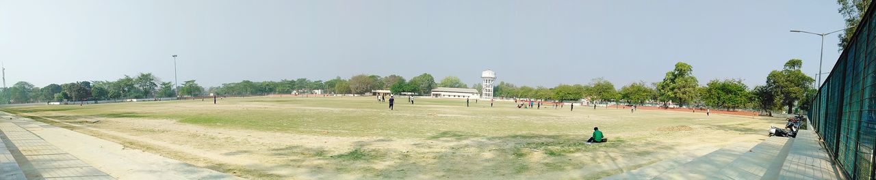 PANORAMIC VIEW OF PEOPLE IN PARK