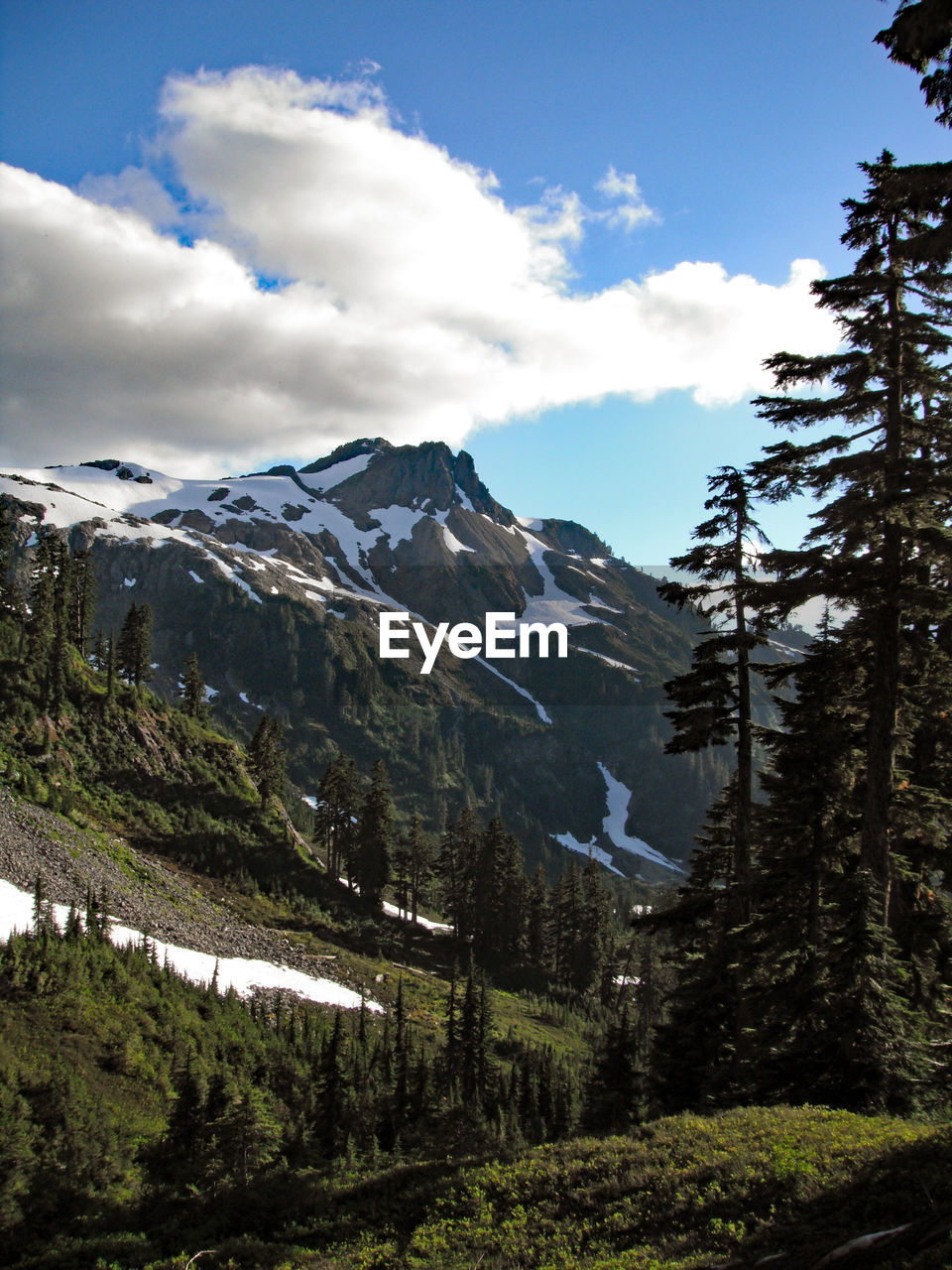 Scenic view of mountains against sky during winter