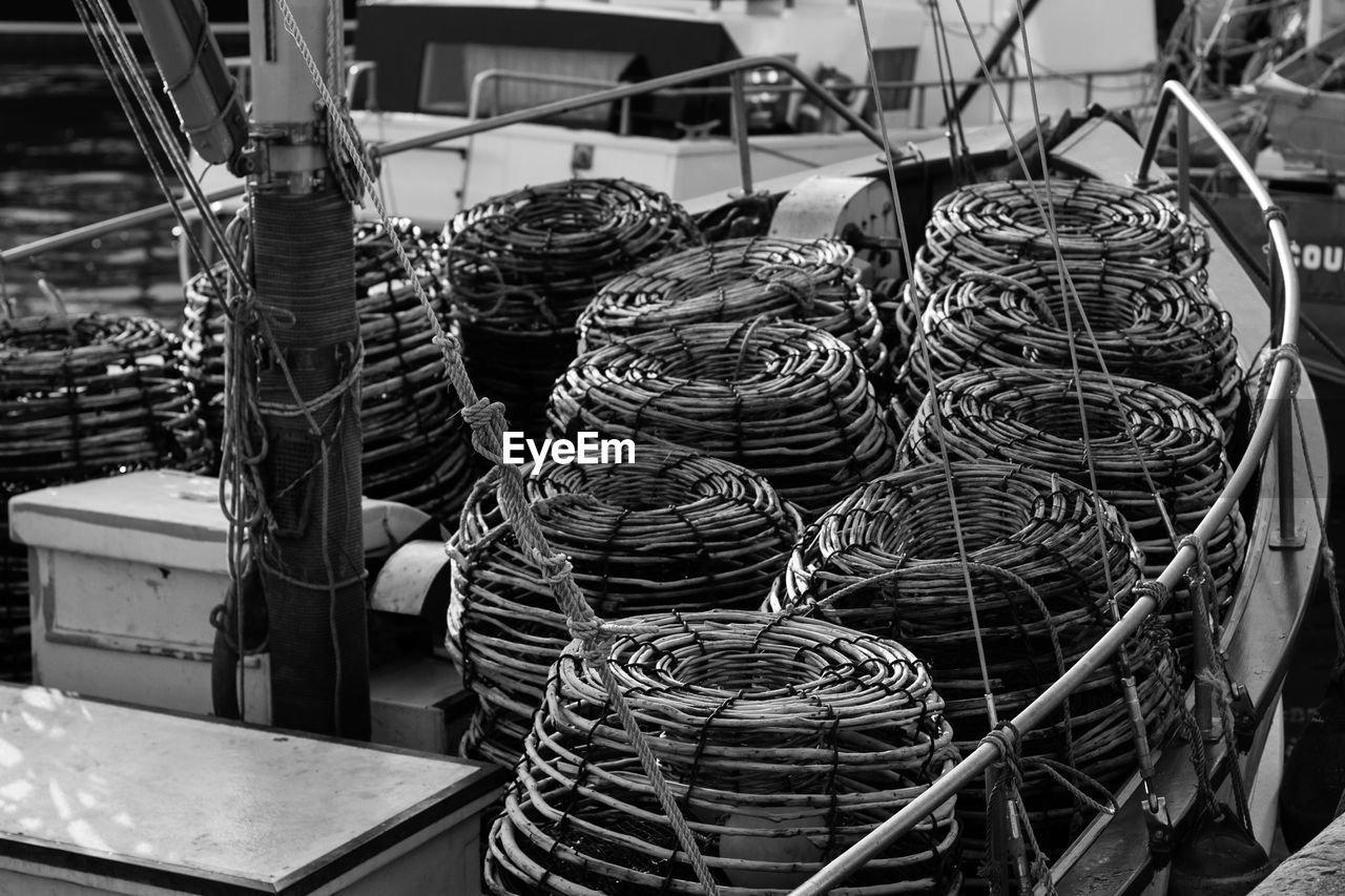 High angle view of crab pots in fishing boat
