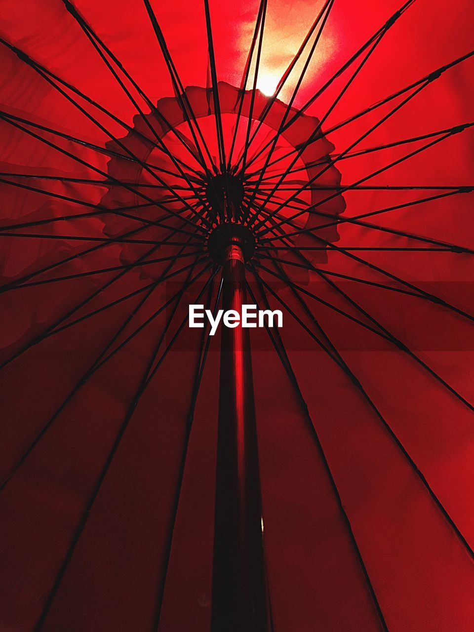 LOW ANGLE VIEW OF FERRIS WHEEL IN SKY