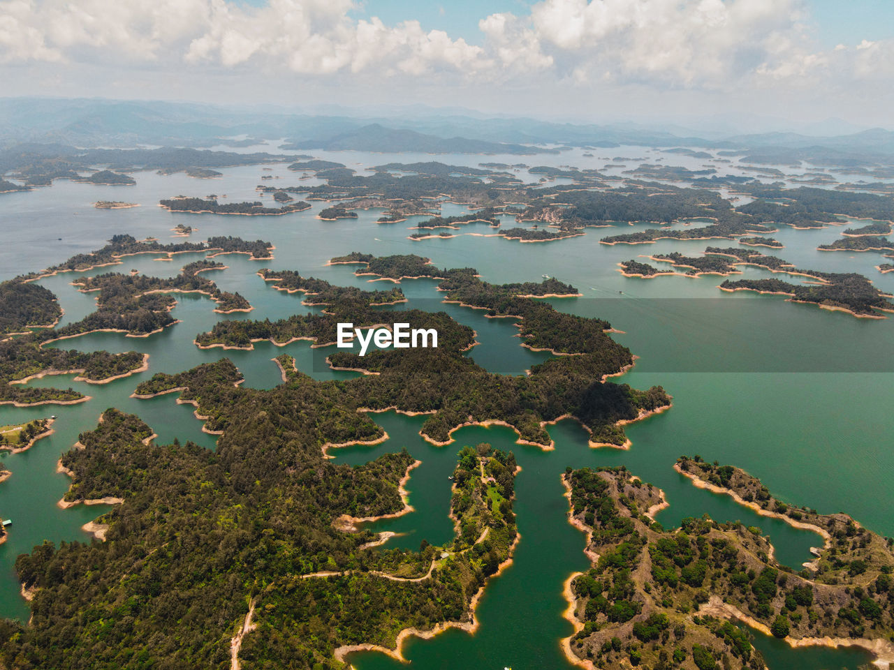 Aerial drone photo of guatape lakes and maze-like shorelines near medellin colombia.