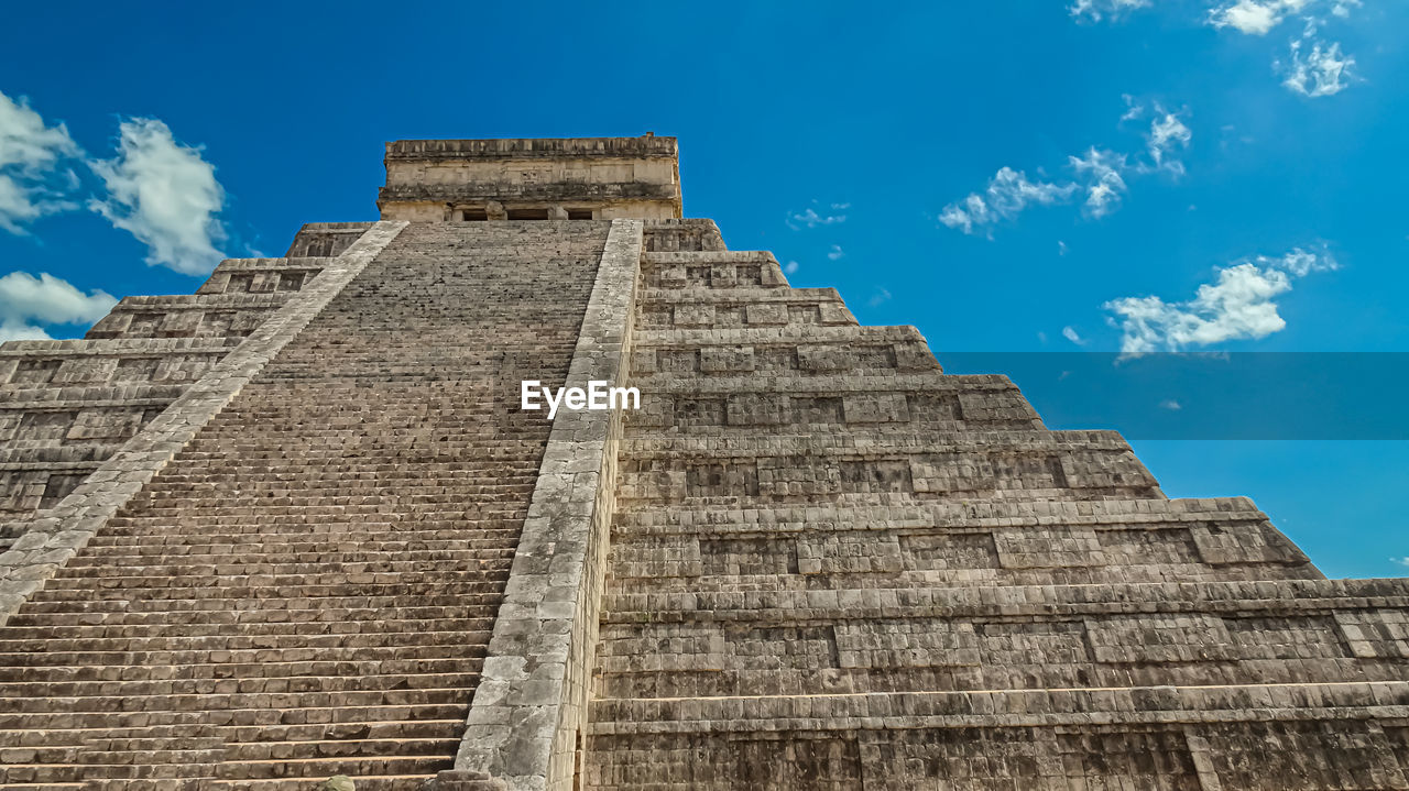 low angle view of old ruins against sky