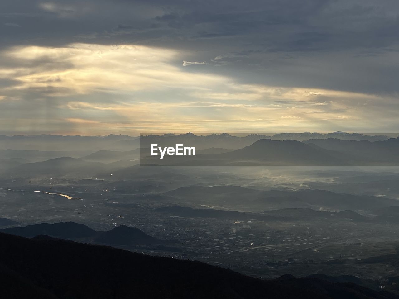 Scenic view of mountains against sky during sunset