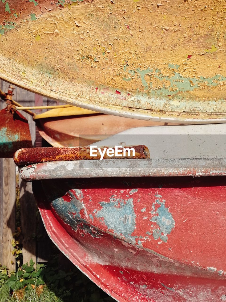 CLOSE-UP OF OLD RUSTY STACK