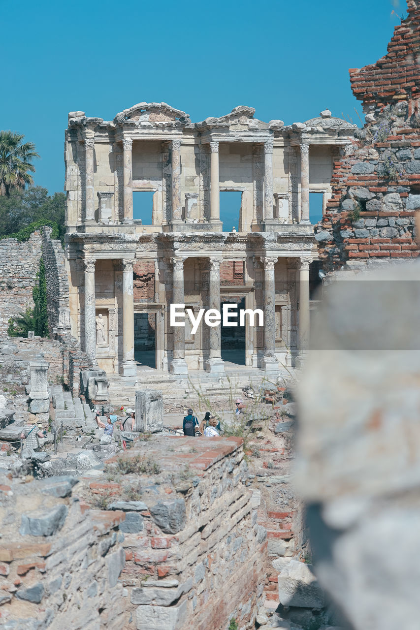 Low angle view of old ruins against sky