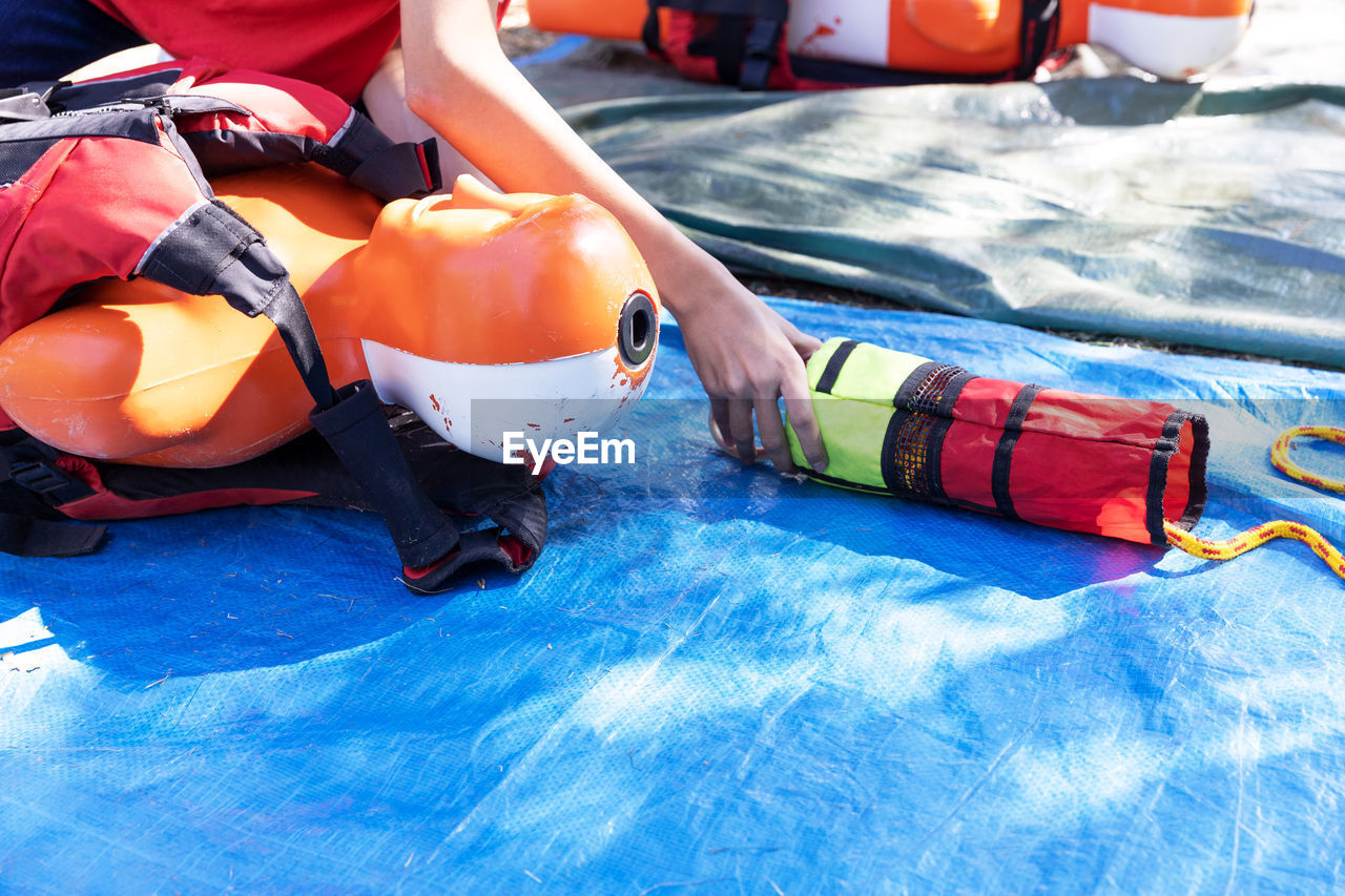 Lifeguard rescue course with training water drowning dummy