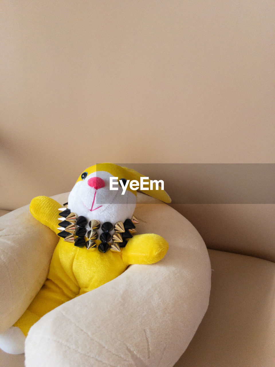 Close-up of a bunny plushie on top of sofa