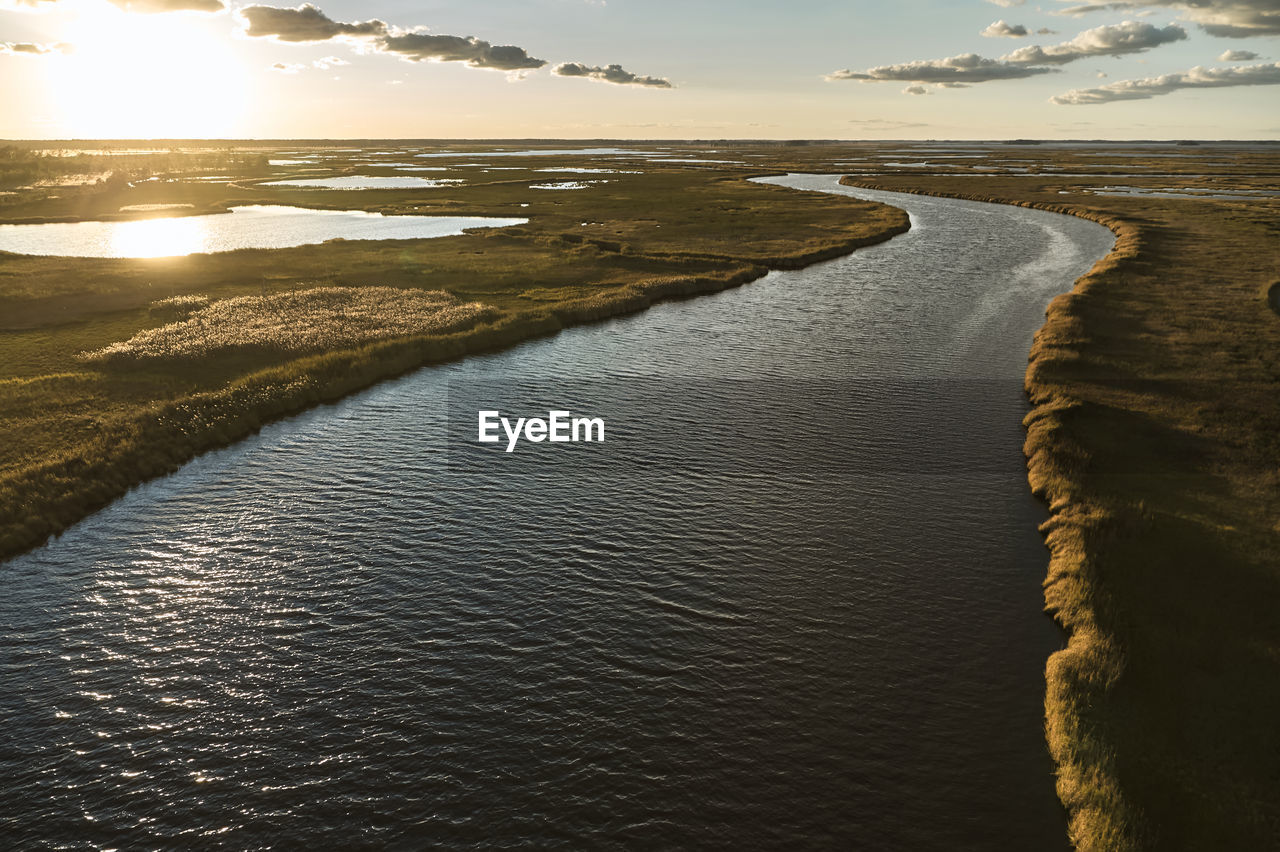 Usa, maryland, drone view of marsh along blackwater river at sunset