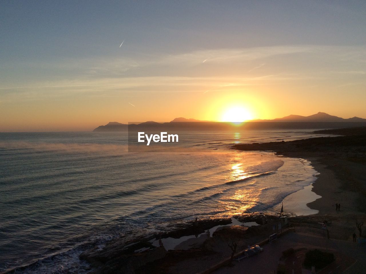 Scenic view of sea against sky during sunset