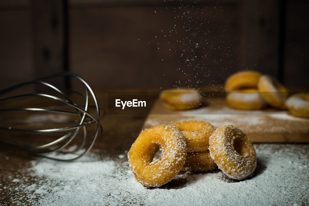 CLOSE-UP OF COOKIES IN CONTAINER