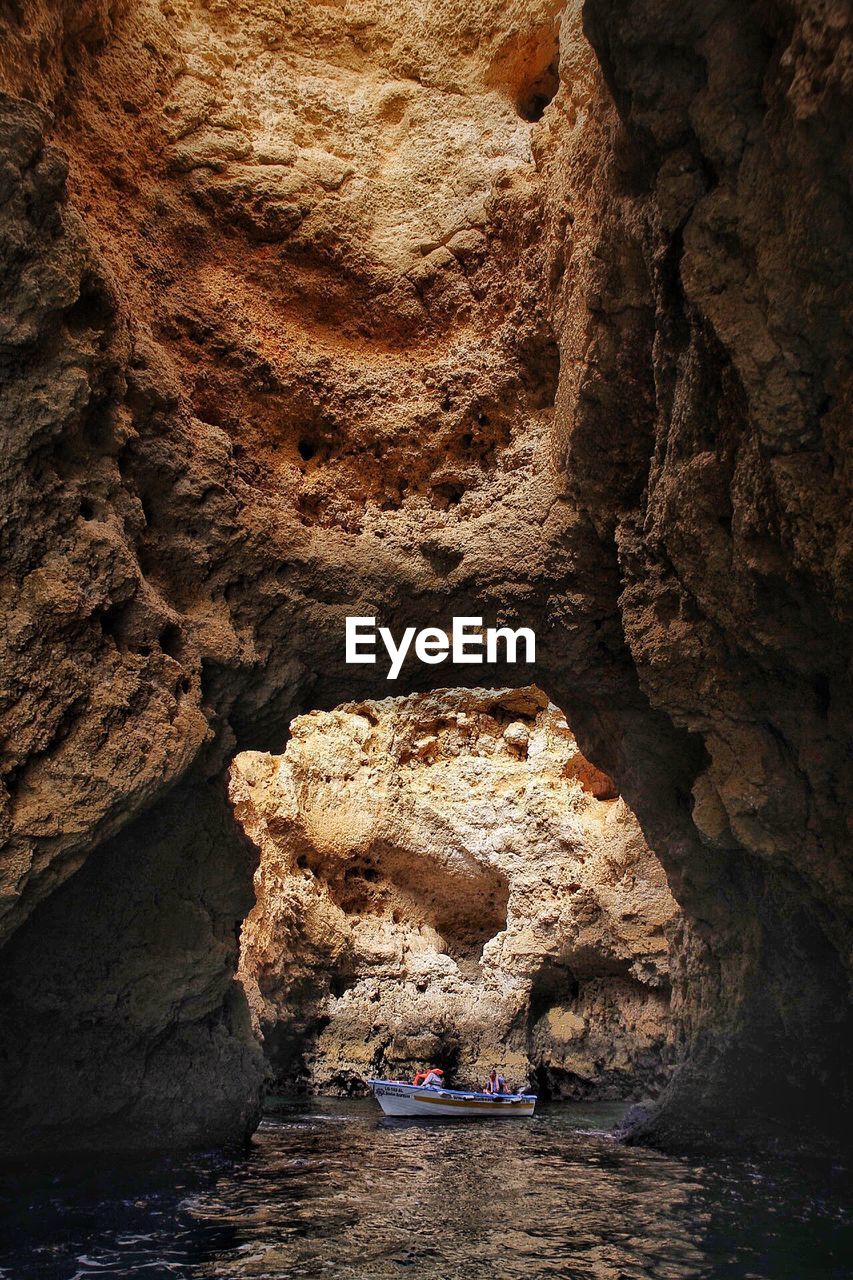 View of cave in river