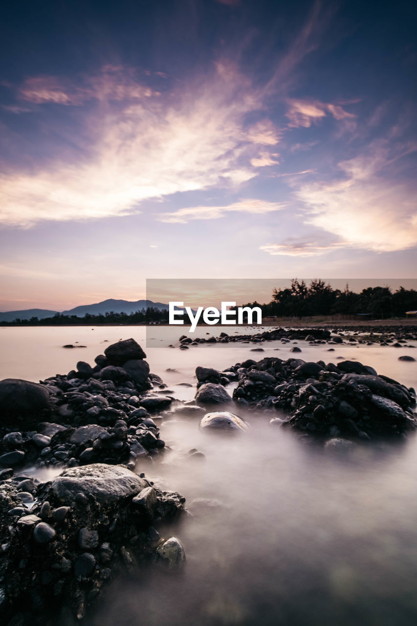 Scenic view of sea against sky during sunset