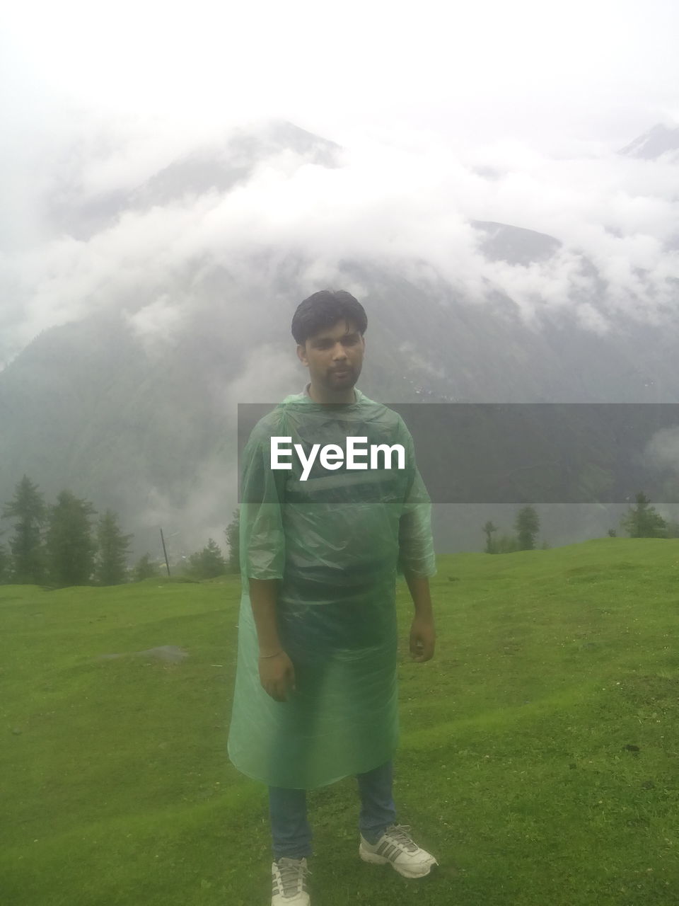 MAN STANDING ON SOCCER FIELD