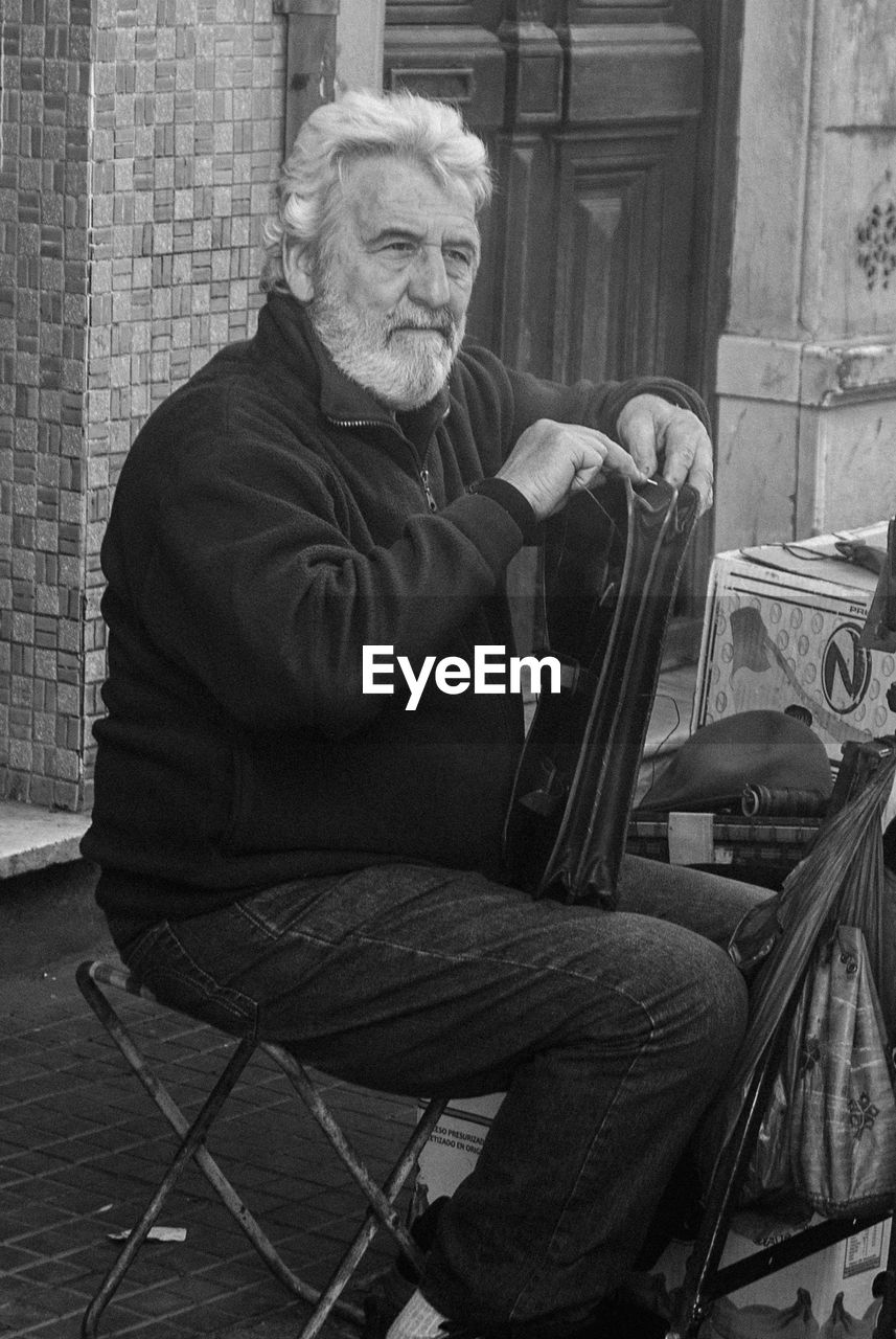 Senior man sitting on chair