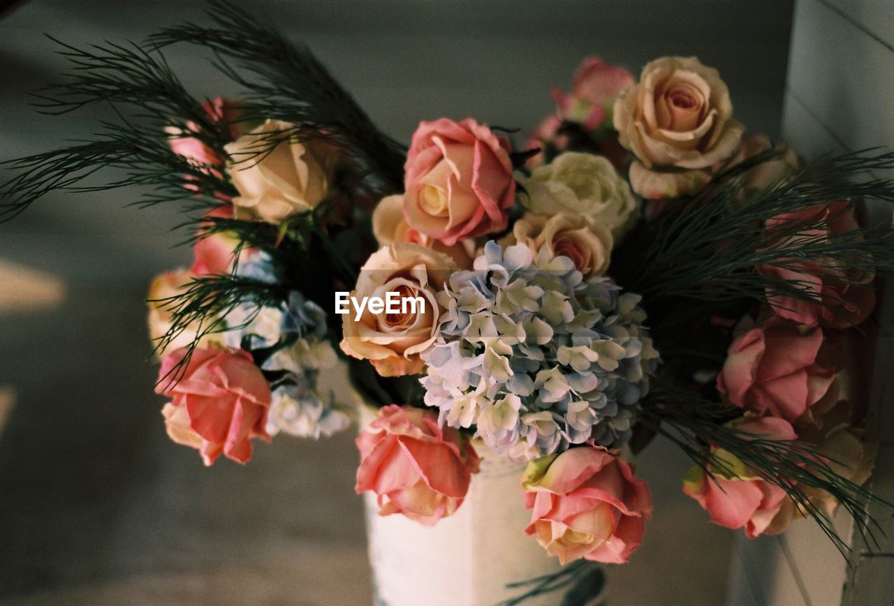 CLOSE-UP OF BOUQUET OF ROSES