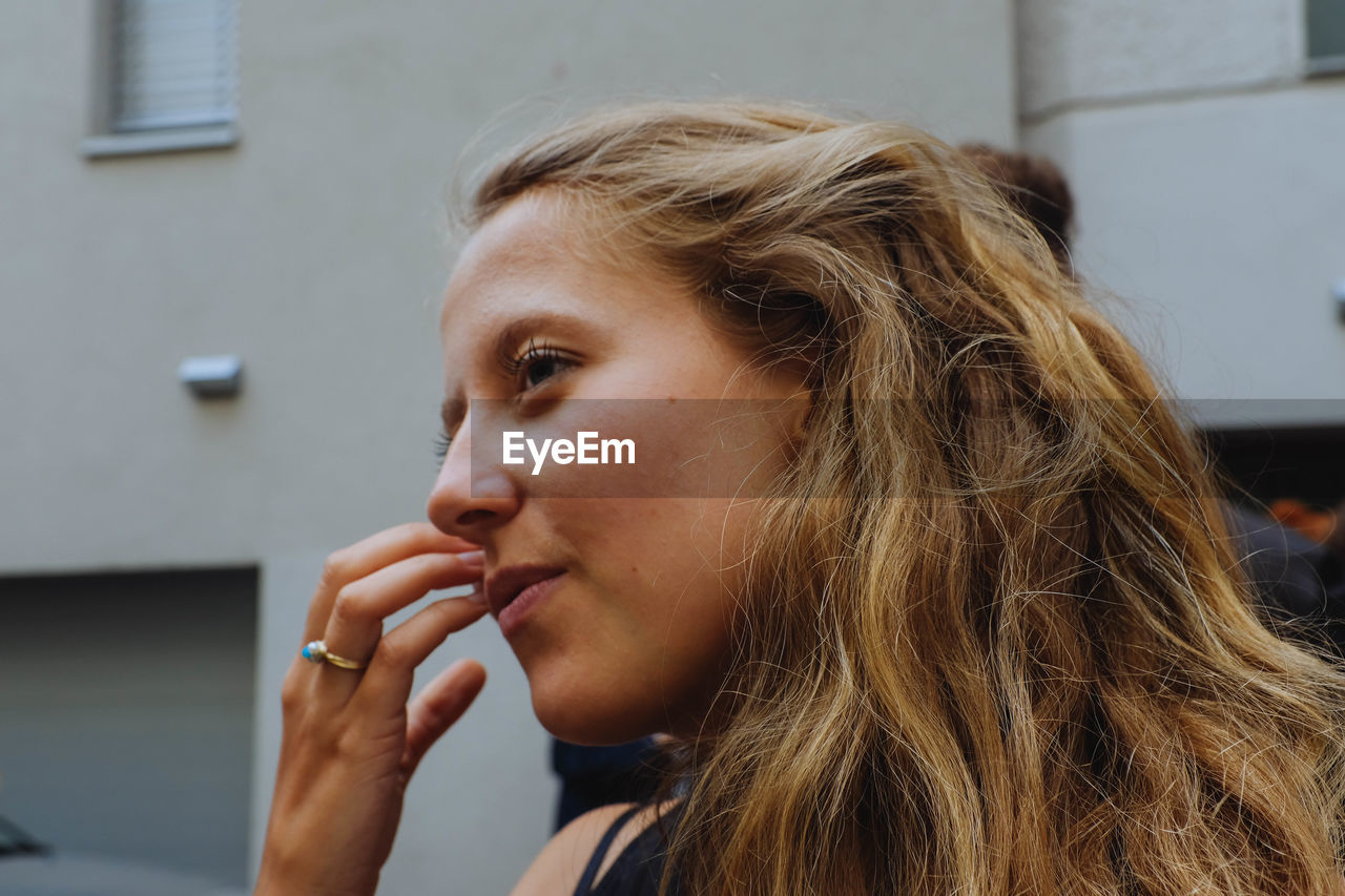 Close-up of woman looking away