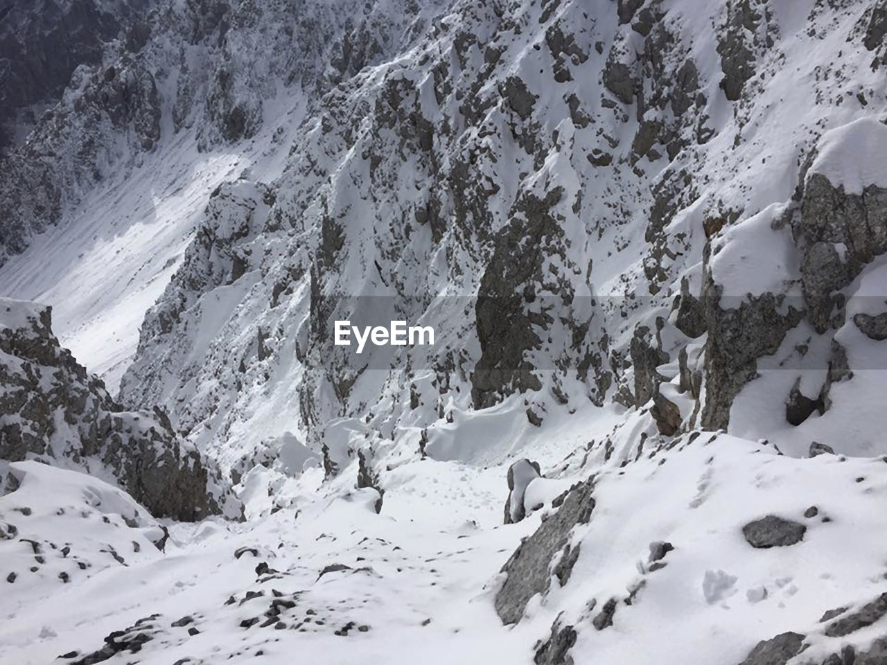 A snow capped mountains in wintertime