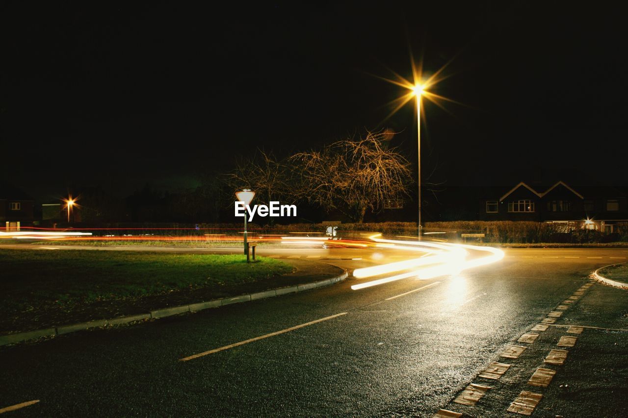 Light trails on road at night