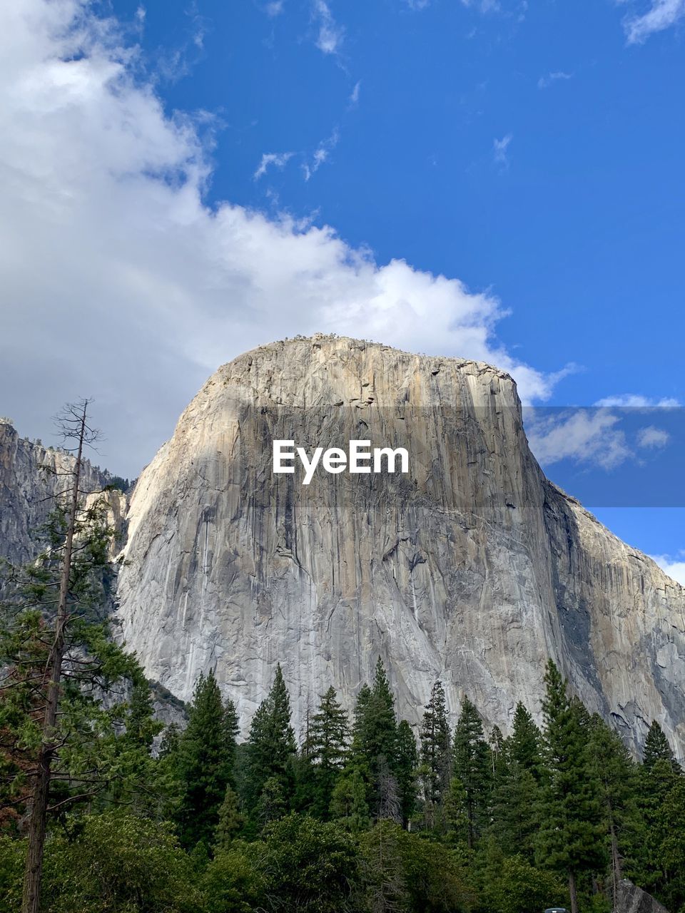 Low angle view of rocks against sky