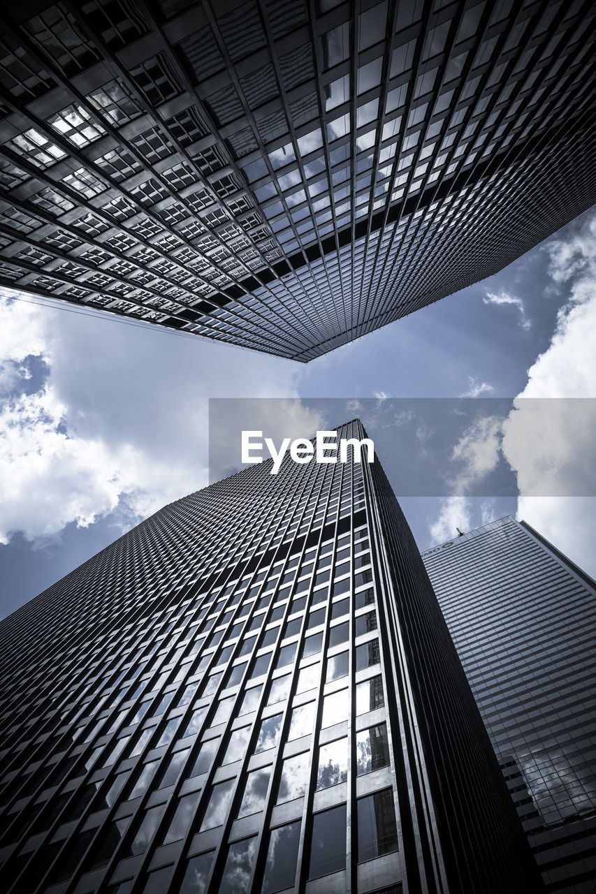 Low angle view of modern building against sky