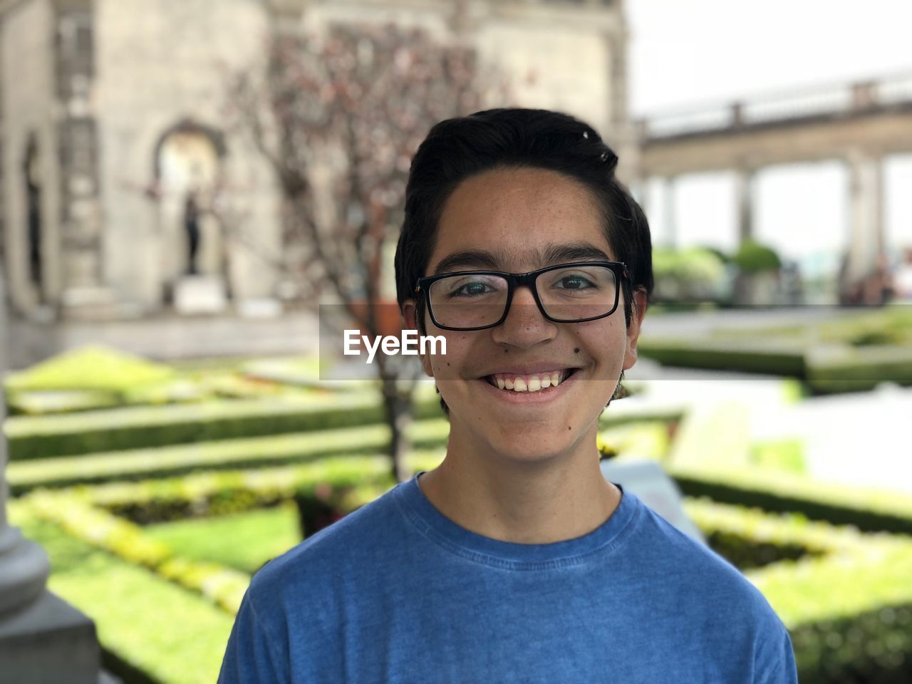 Portrait of smiling boy wearing eyeglasses