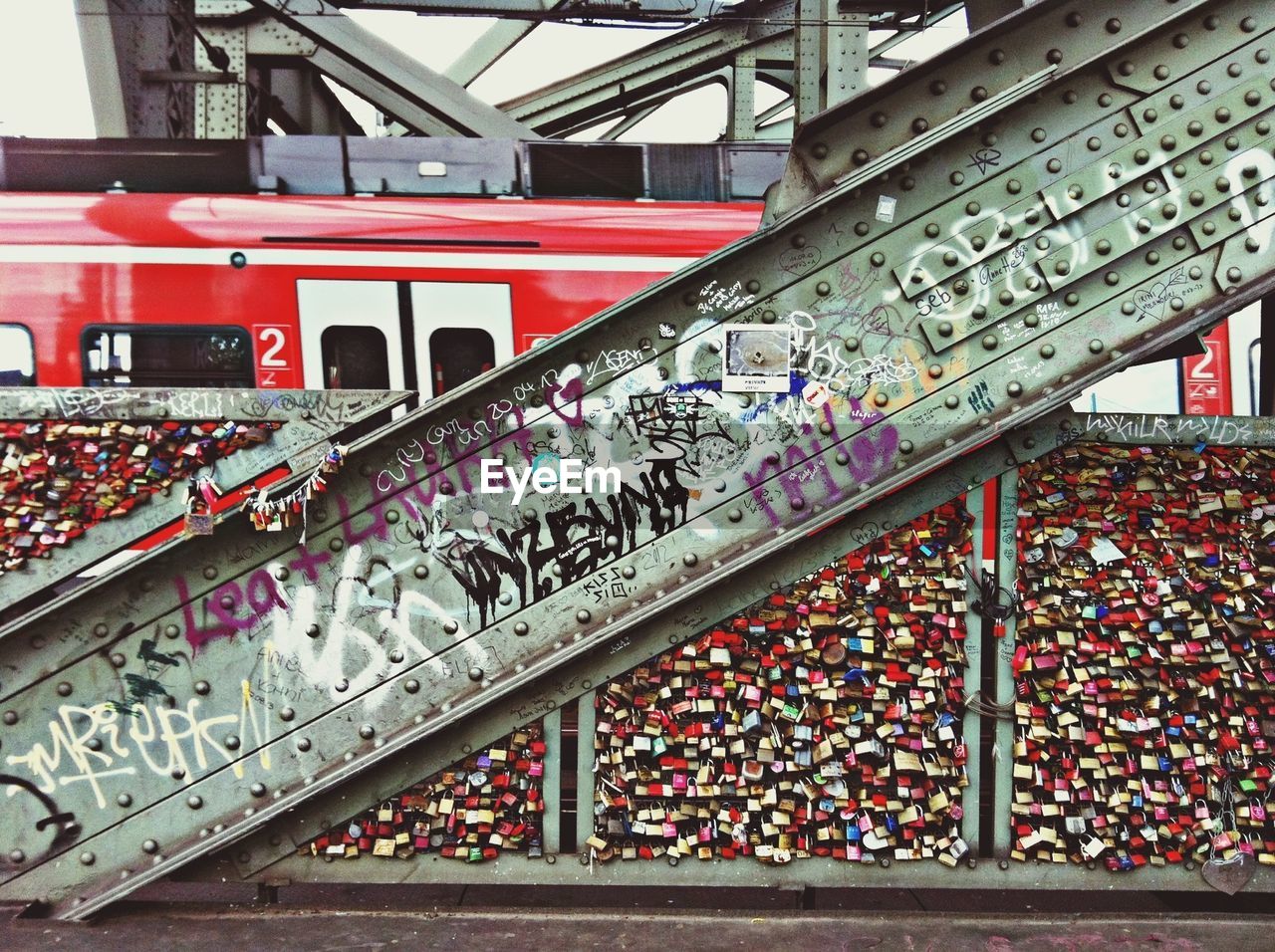 Close-up of graffiti on metallic beam