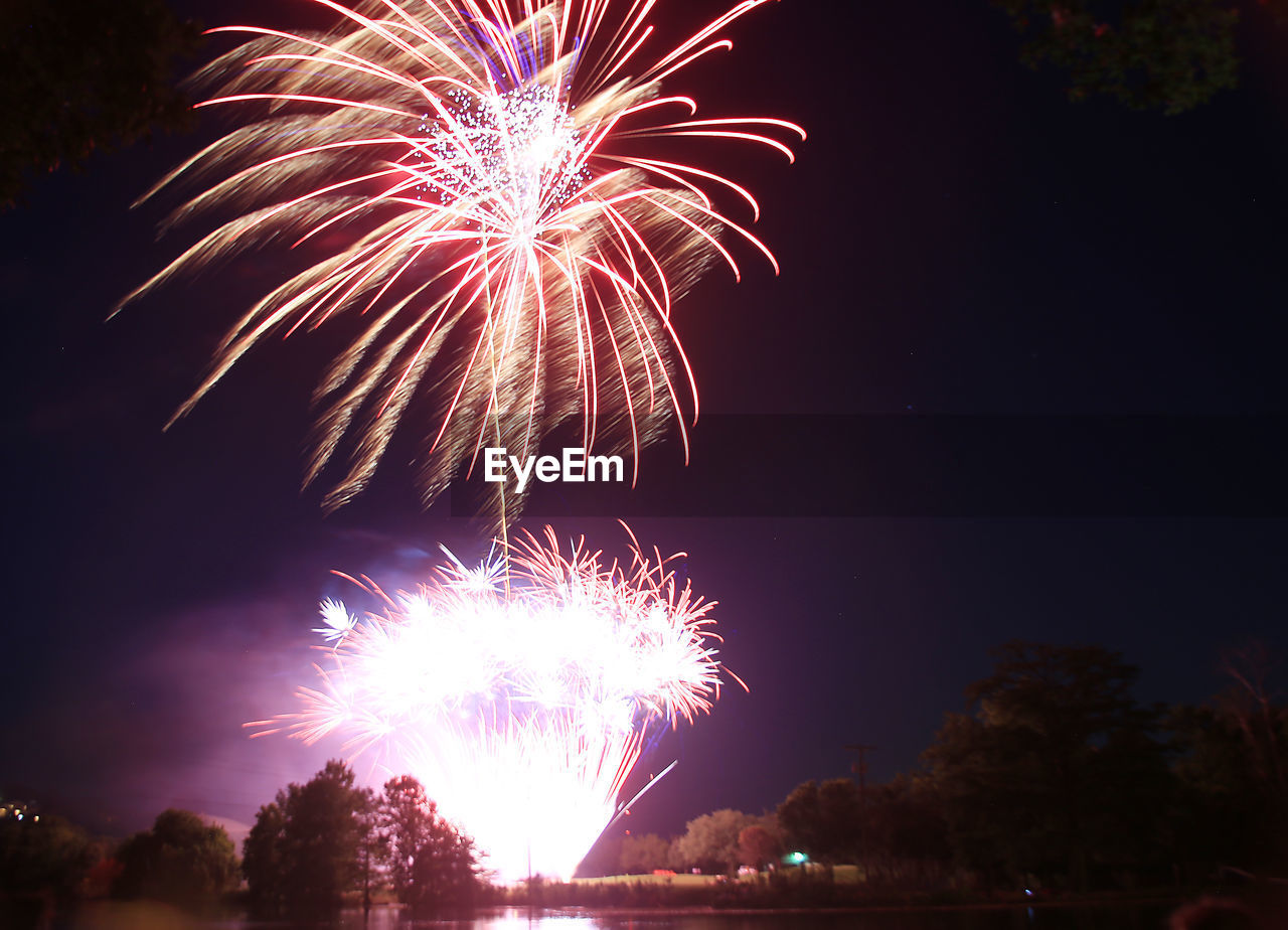 Firework display at night