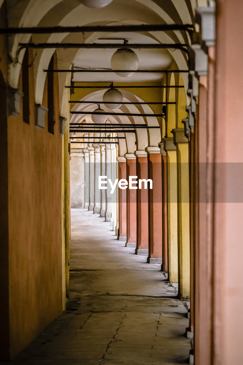 Typical italian alley of the city of modena, in the emilia romagna.